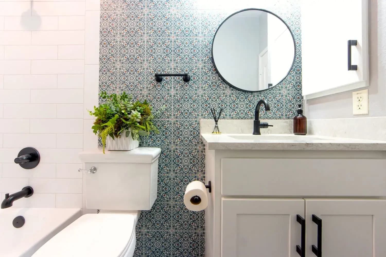 San Diego bathroom before remodel with dated fixtures and tile
