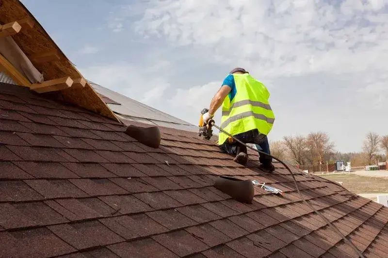 HOW ASPHALT ROOFING IMPROVES YOUR HOME'S VALUE IN SAN DIEGO 1 62ced74345e2db3663fdd1ae roof worker on asphalt roof p 800